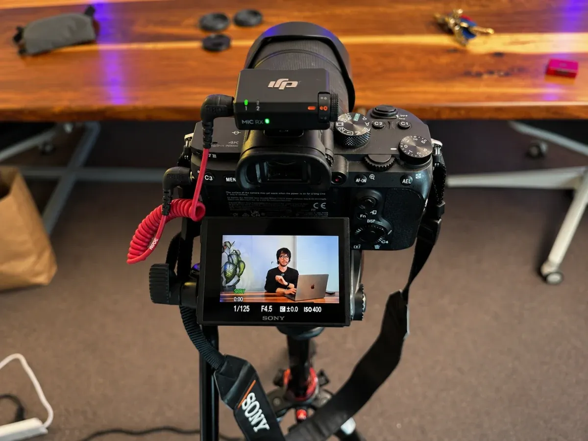A camera framed on a client interview, mid-shoot in the Localizr office